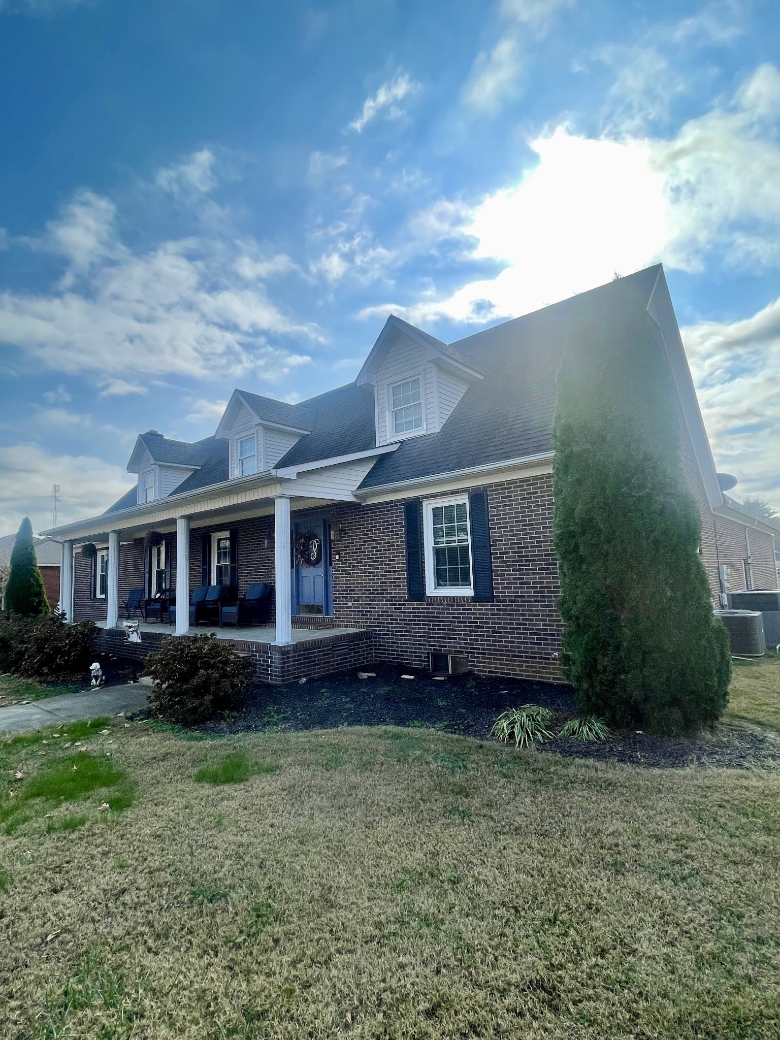 405 Robins Street Lawrenceburg, TN 38464 - Photo 57 of 65 a front view of a house with a garden