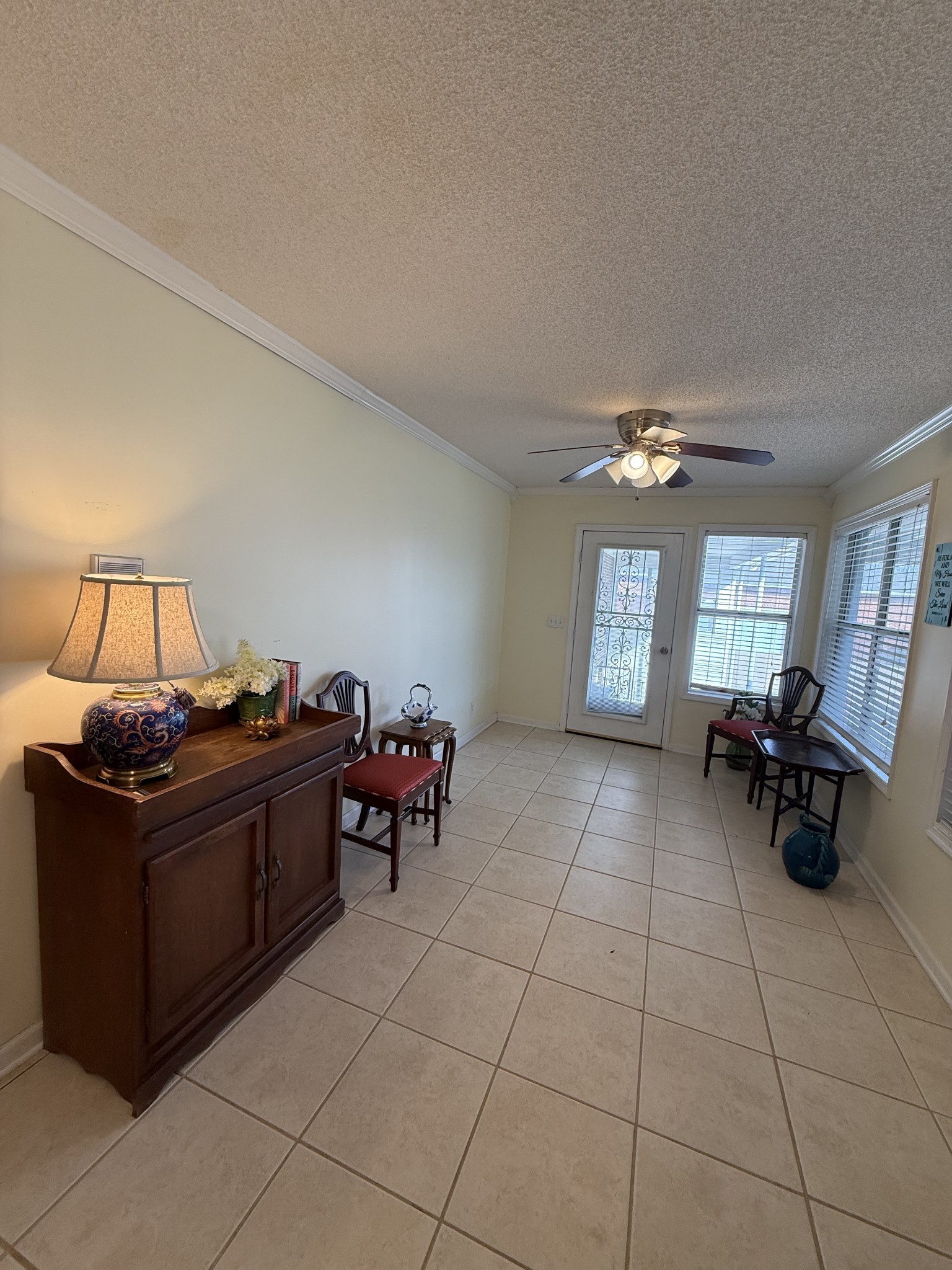 405 Robins Street Lawrenceburg, TN 38464 - Photo 58 of 65 a living room with furniture and a chandelier