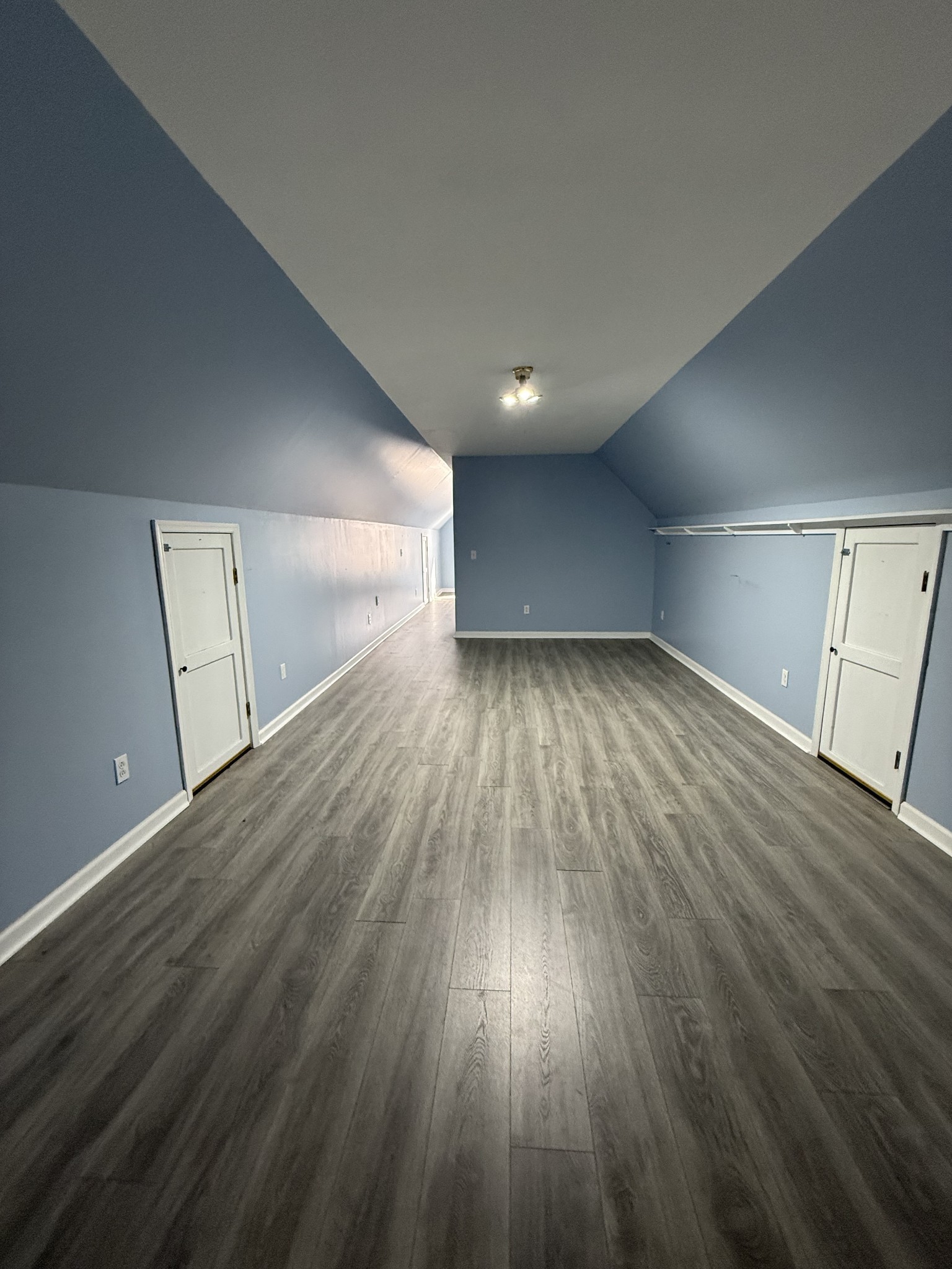 405 Robins Street Lawrenceburg, TN 38464 - Photo 61 of 65 a view of an empty room with wooden floor