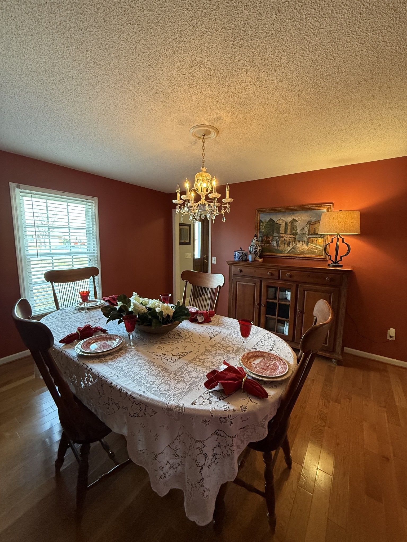 405 Robins Street Lawrenceburg, TN 38464 - Photo 10 of 65 a view of a dining room with furniture and chandelier
