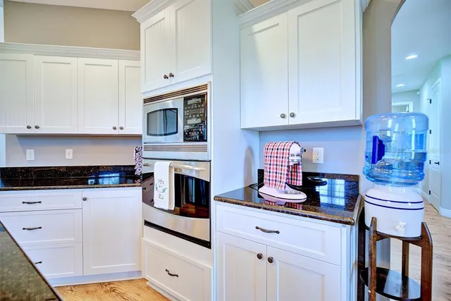 a utility room with sink dryer and washer