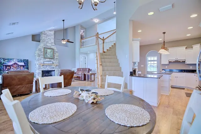 a bedroom with furniture and a window