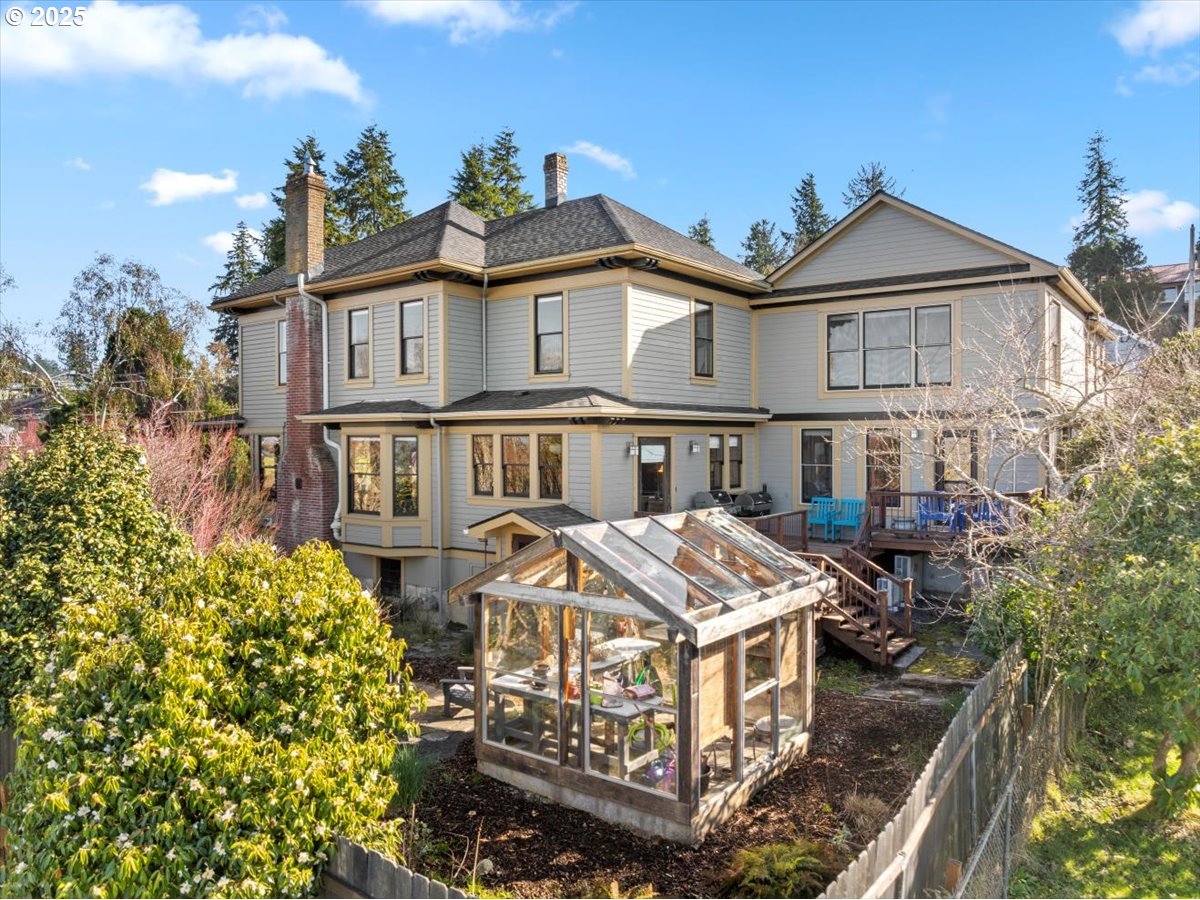 a front view of a residential apartment building with a yard
