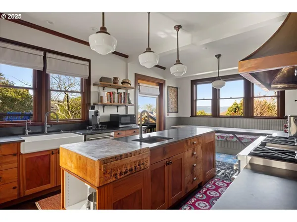 a kitchen with wooden cabinets and a stove