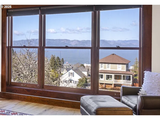 a living room with large windows