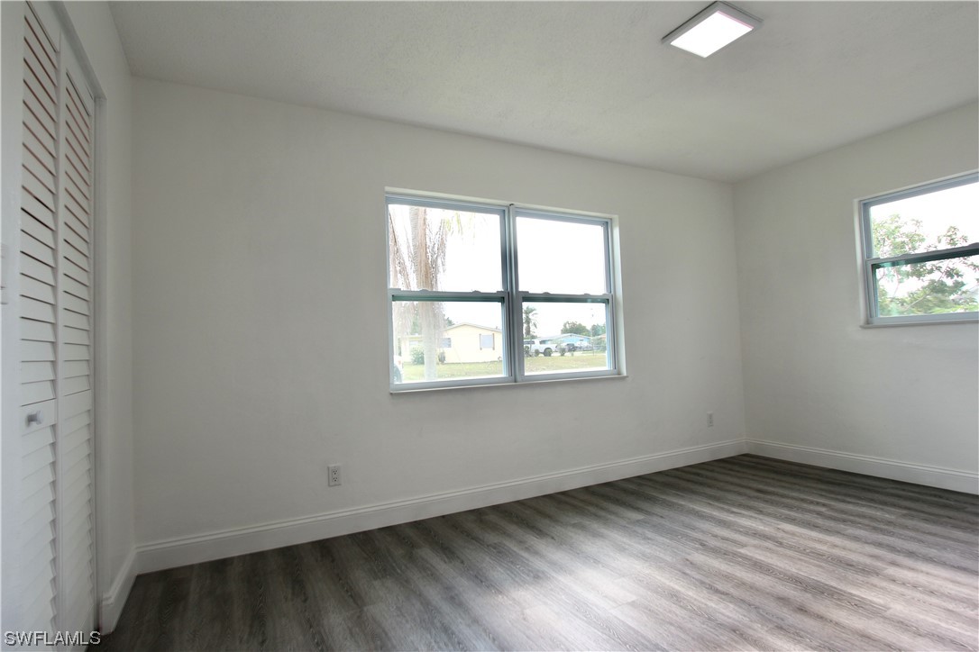 116 Oleander Road Lehigh Acres, FL 33936 - Photo 15 of 31 an empty room with a window
