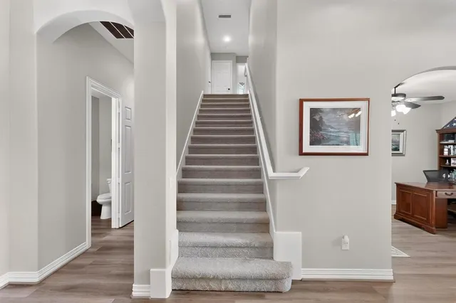 a room with furniture and wooden floor