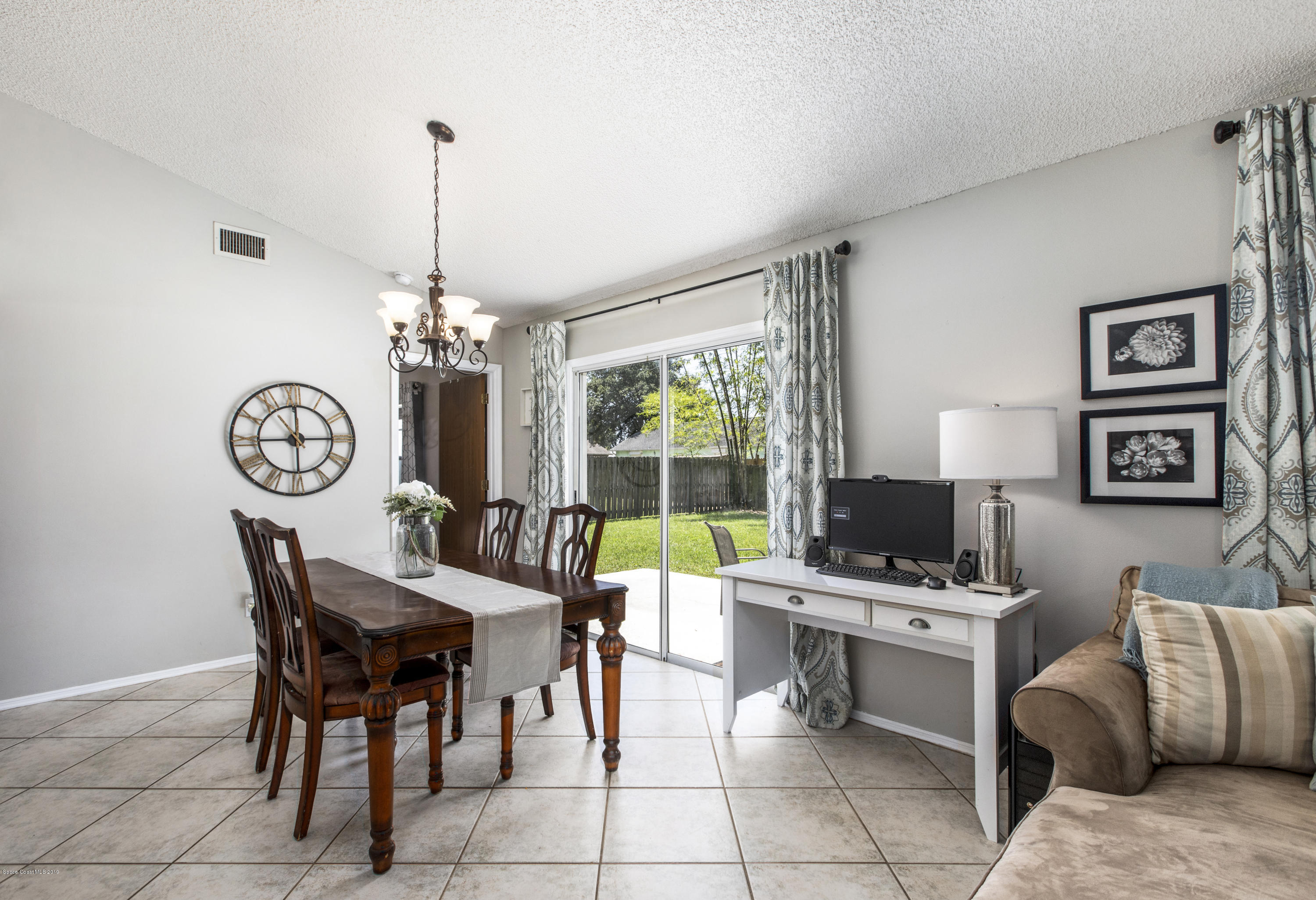 167 Twin Lakes Road Melbourne, FL 32901 - Photo 13 of 29 Dining with Slider