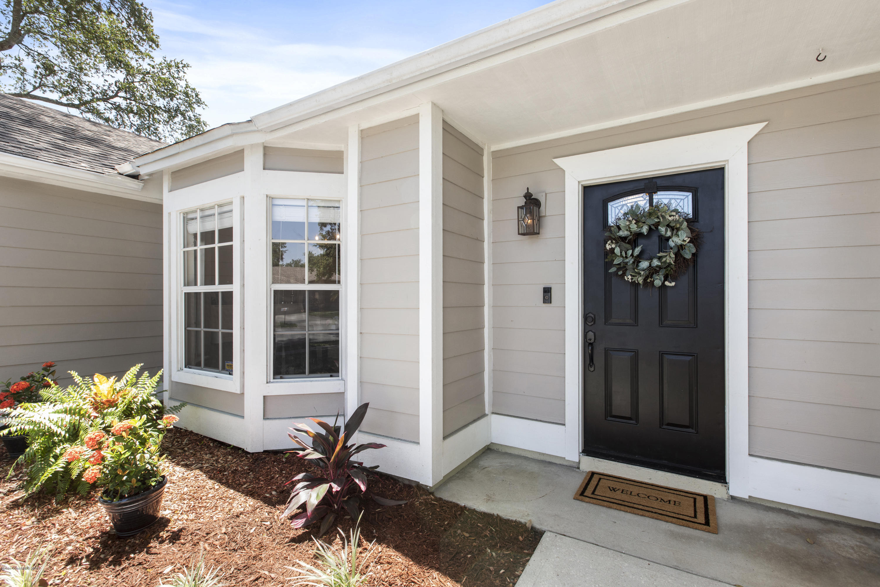 167 Twin Lakes Road Melbourne, FL 32901 - Photo 3 of 29 Covered Entry