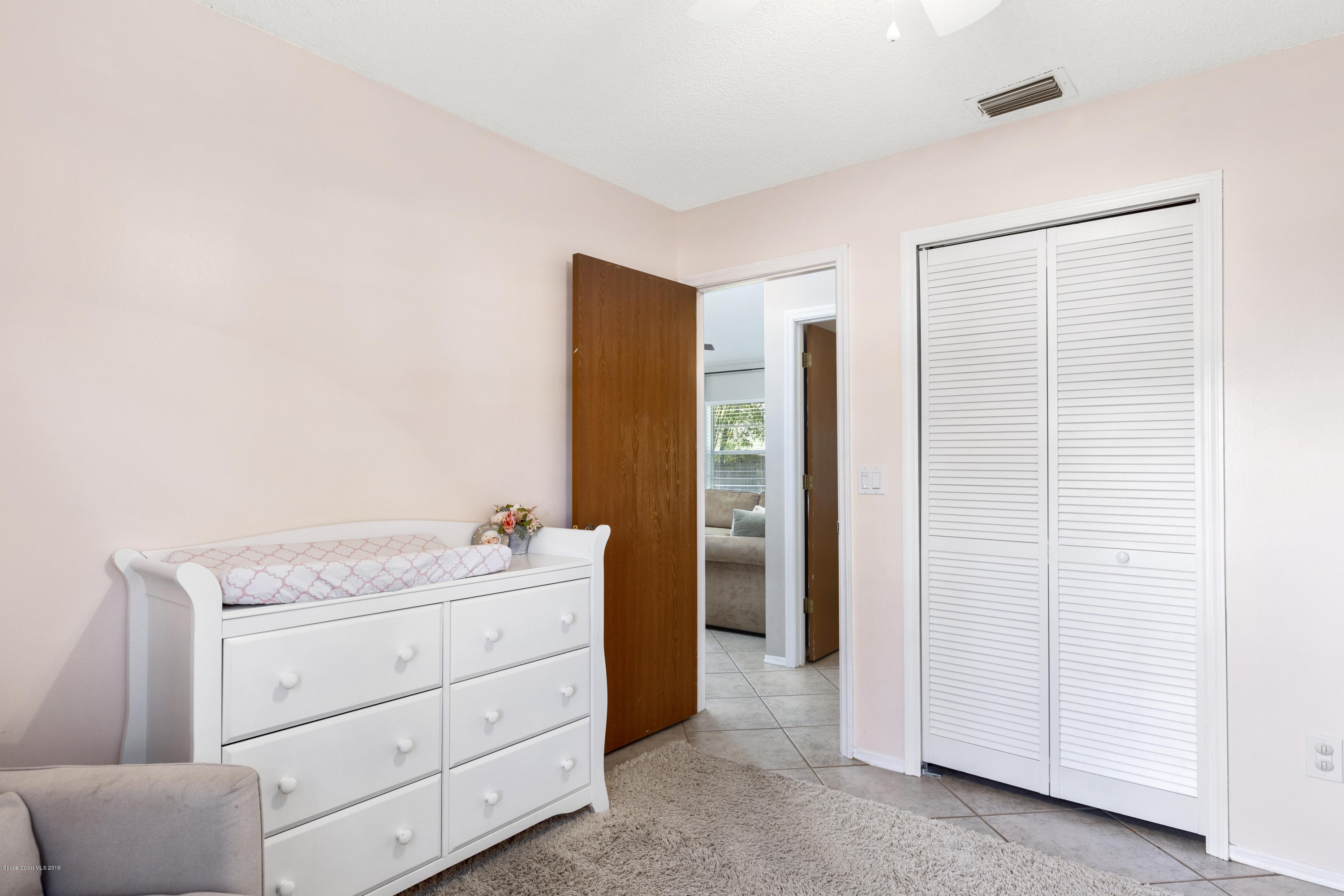 167 Twin Lakes Road Melbourne, FL 32901 - Photo 23 of 29 Bedroom 3