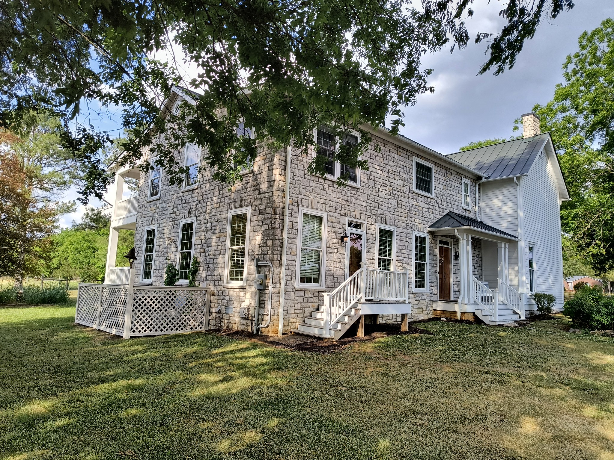 3460 Big Springs Road Lebanon, TN 37090 - Photo 4 of 74 a front view of a house with a garden
