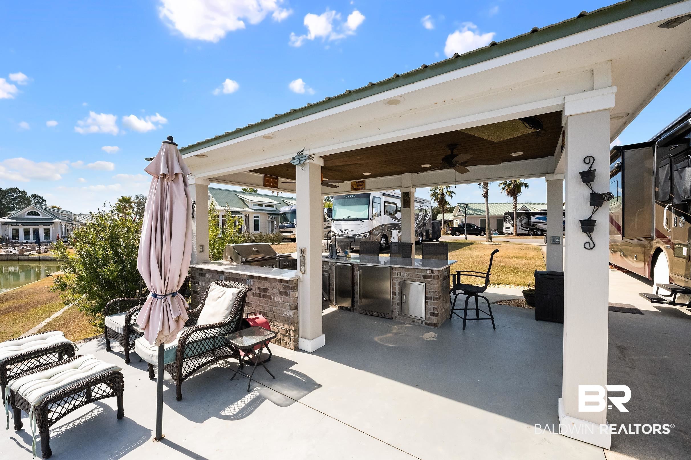 11996 Raptor Court Elberta, AL 36530 - Photo 7 of 45 View of patio / terrace featuring a ceiling fan and area for grilling