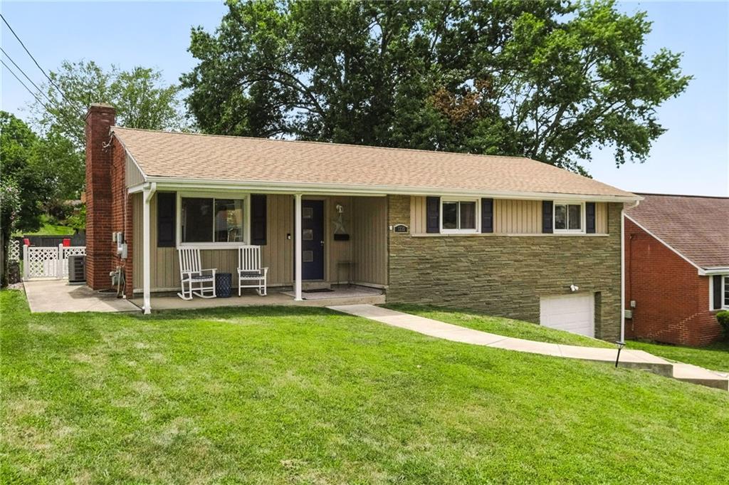 1335 Cardinal Drive Pittsburgh, PA 15243 - Photo 2 of 34 a view of a house with a yard and sitting area