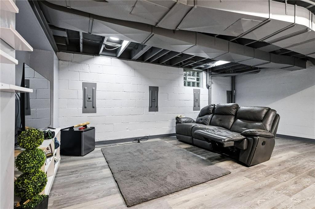 1335 Cardinal Drive Pittsburgh, PA 15243 - Photo 23 of 34 a living room with furniture and a couch