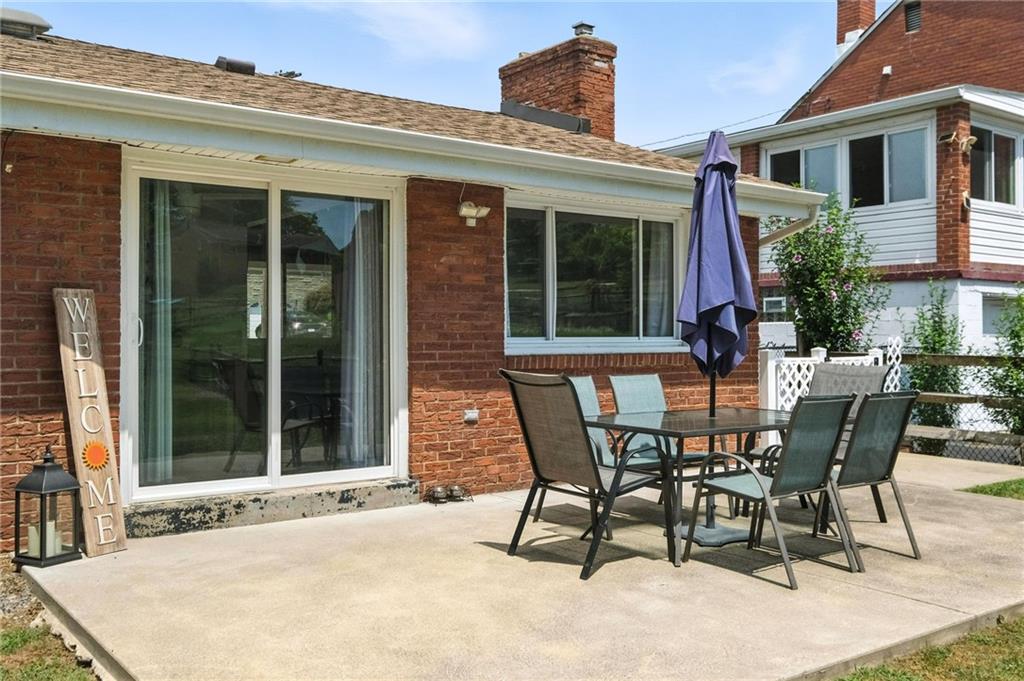 1335 Cardinal Drive Pittsburgh, PA 15243 - Photo 27 of 34 a view of a house with a backyard and sitting area
