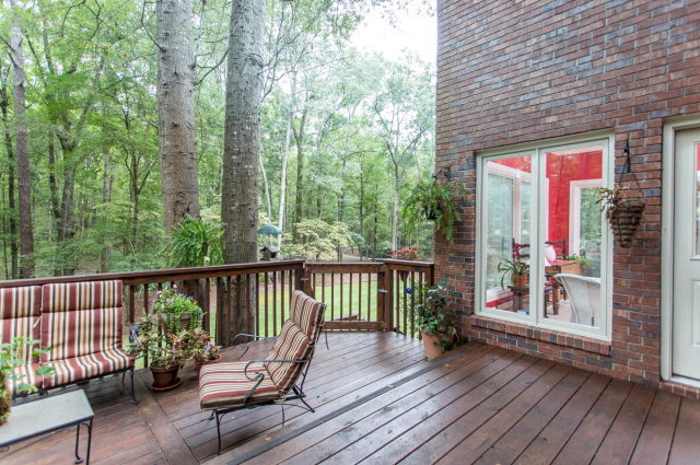 6781 Colaparchee Road Macon, GA 31210 - Photo 23 of 45 a view of a two chairs on the deck