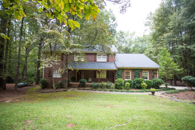 6781 Colaparchee Road Macon, GA 31210 - Photo 40 of 45 a front view of a house with garden
