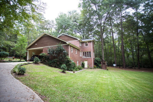 6781 Colaparchee Road Macon, GA 31210 - Photo 42 of 45 a house that has a tree in front of it