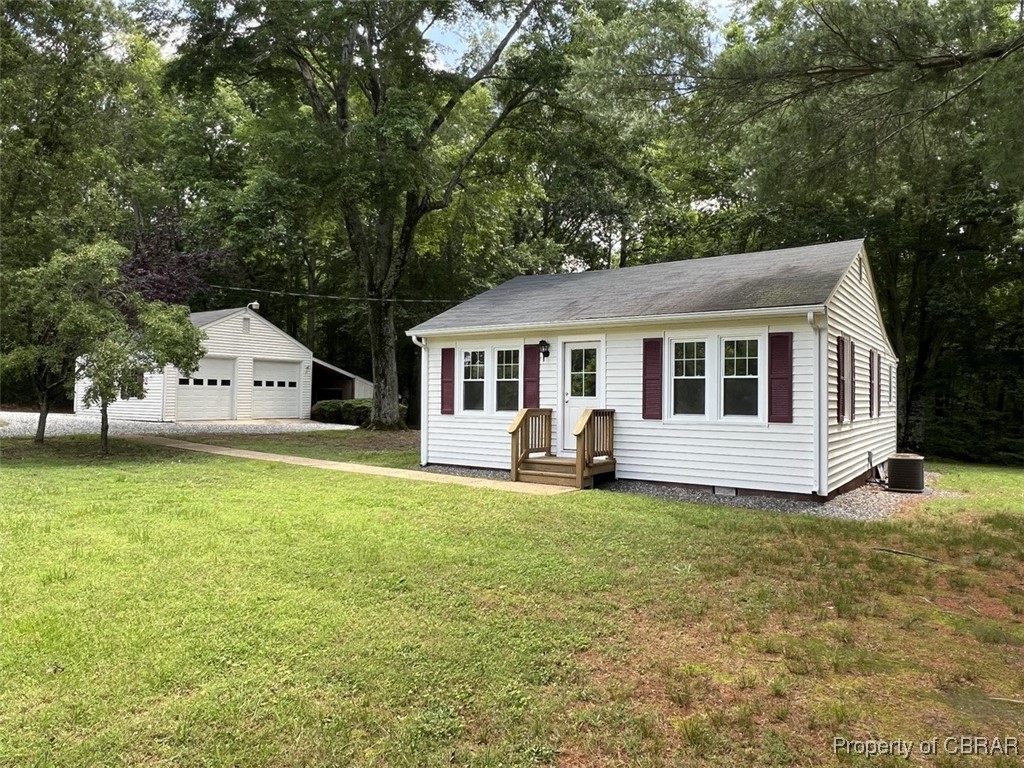 398 Philpot Road Locust Hill, VA 23092 - Photo 1 of 17 View of outdoor structure featuring central AC unit