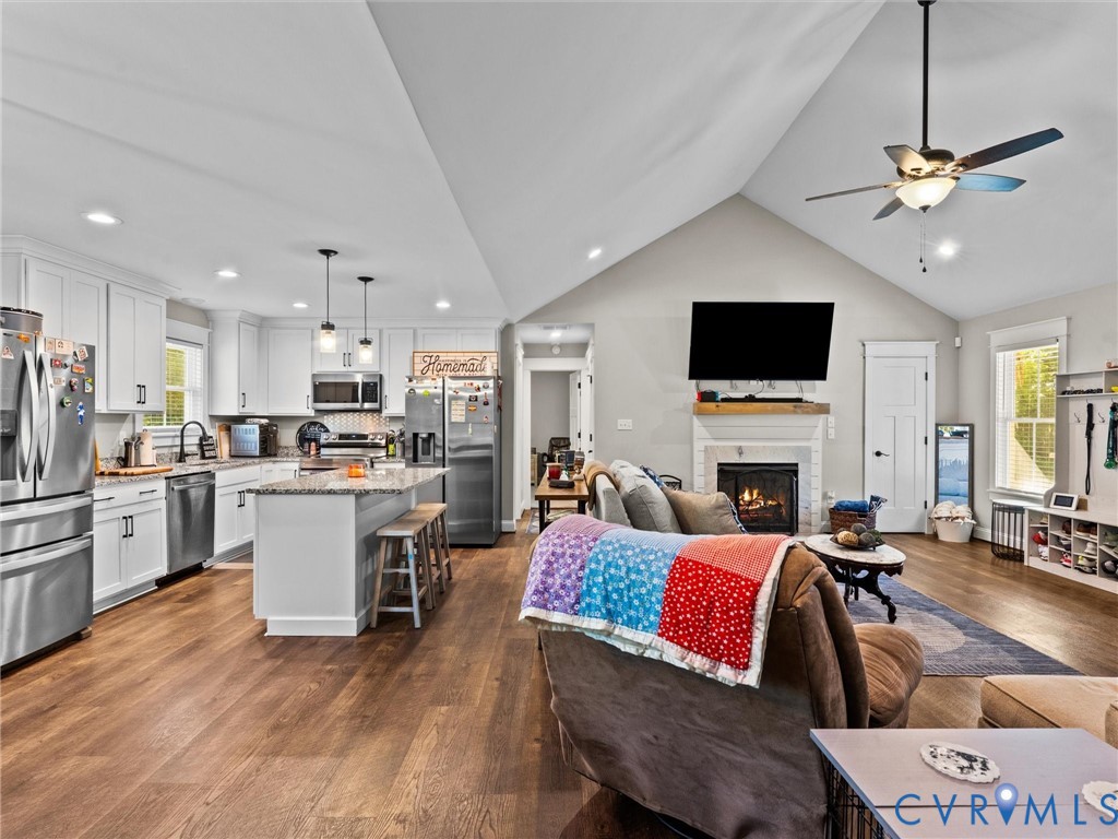 10819 Vaughan Road Petersburg, VA 23805 - Photo 33 of 45 Open-concept living space featuring wood-style flo