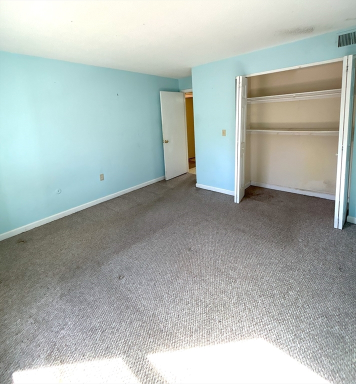 6 Shadowbrook Lane, Unit 9 Milford, MA 01757 - Photo 7 of 14 a view of empty room