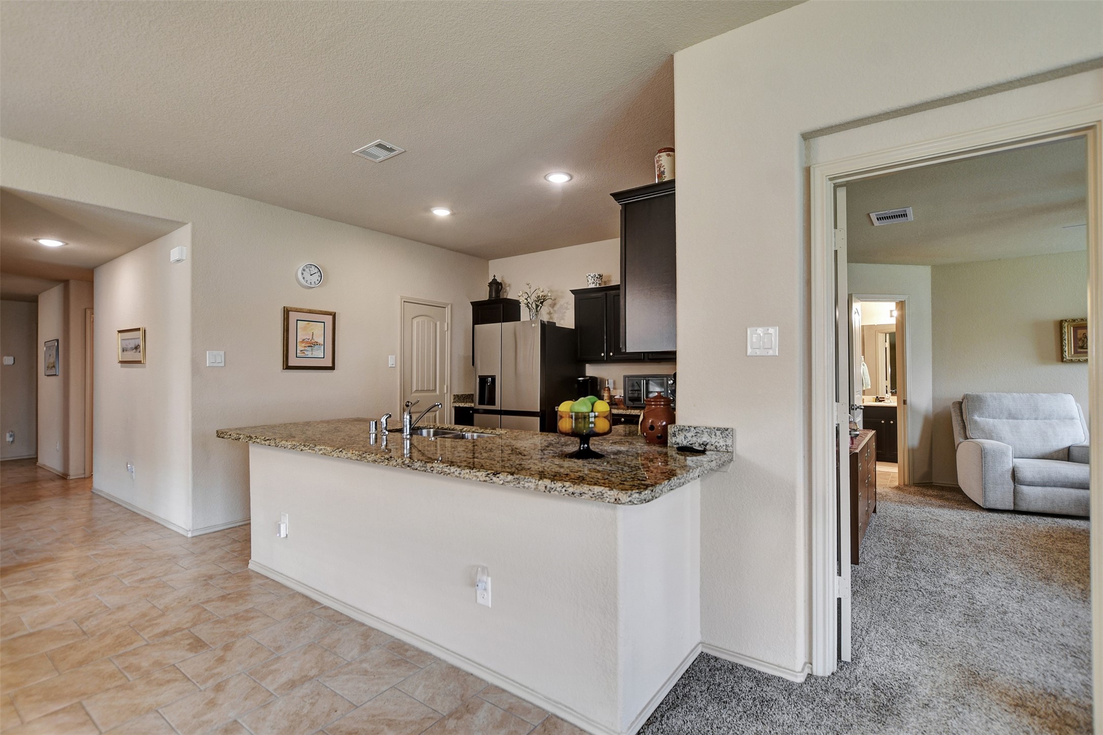 23314 Sawmill Pass Spring, TX 77373 - Photo 13 of 41 a view of living room with granite countertop furniture and a couch