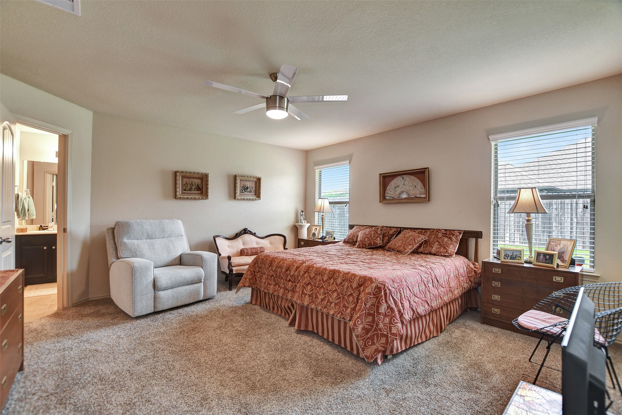 23314 Sawmill Pass Spring, TX 77373 - Photo 25 of 41 a bedroom with a bed and a couch