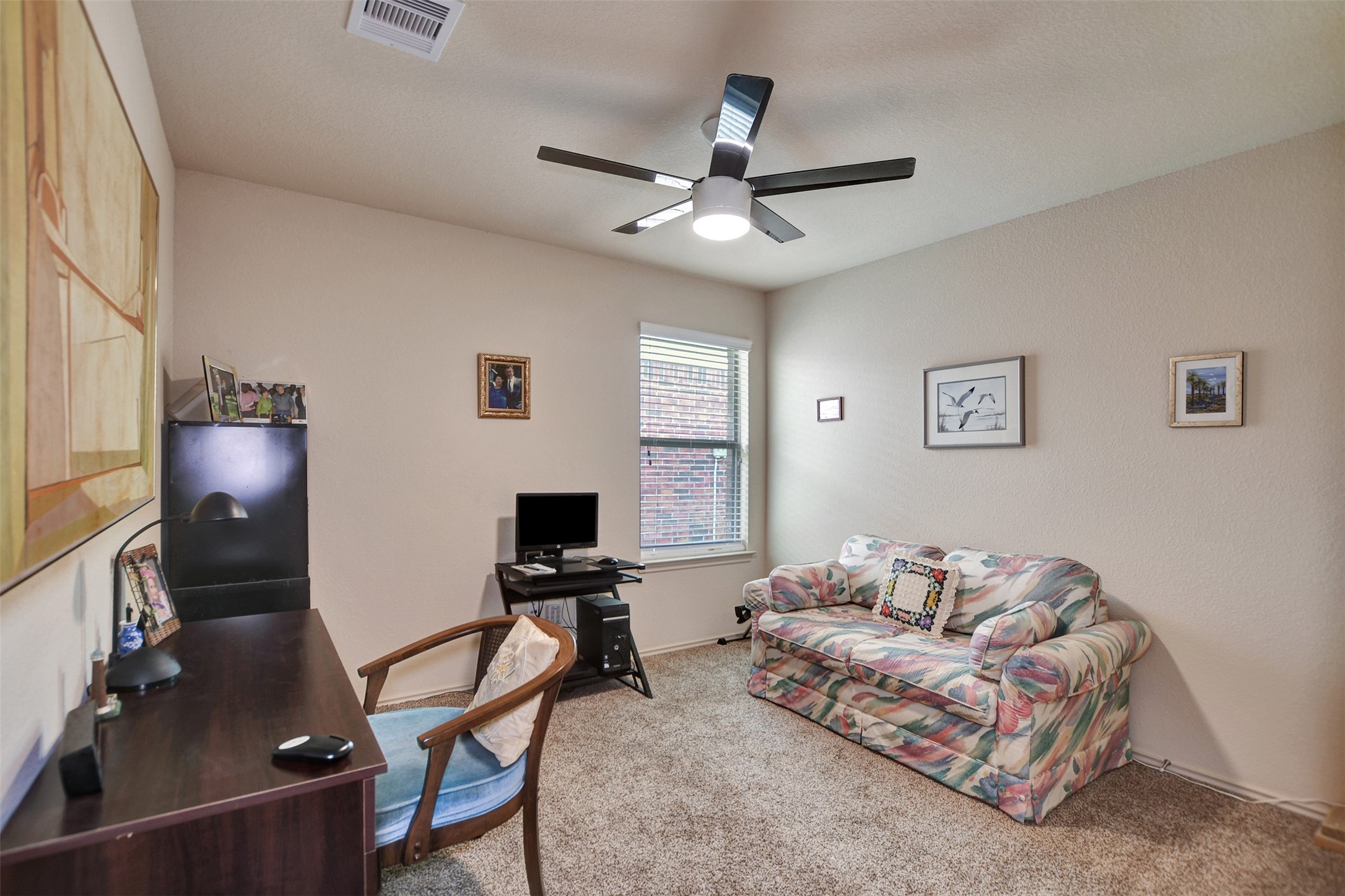 23314 Sawmill Pass Spring, TX 77373 - Photo 31 of 41 a livingroom with workspace couch and a window