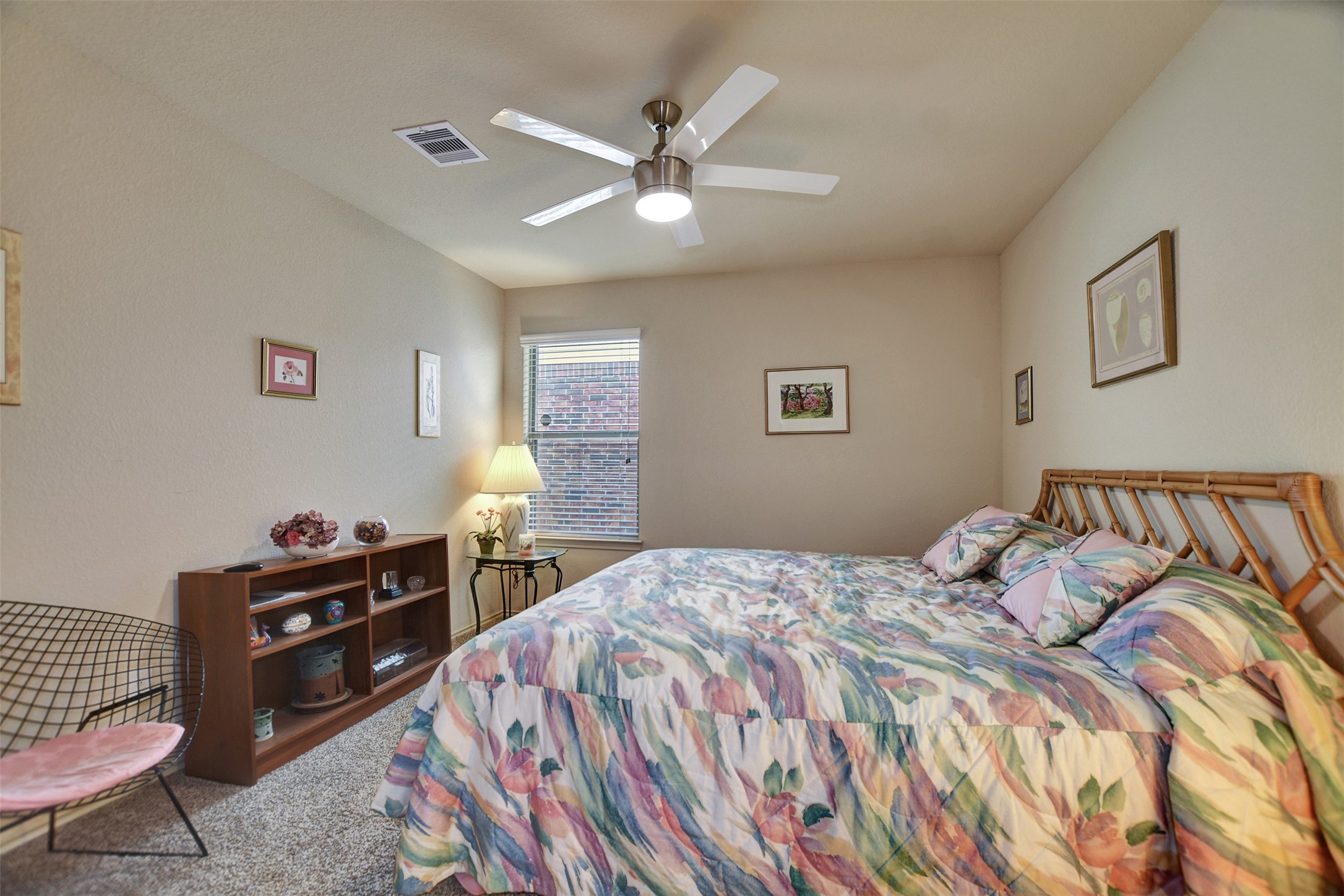 23314 Sawmill Pass Spring, TX 77373 - Photo 32 of 41 a bedroom with a bed and a dresser