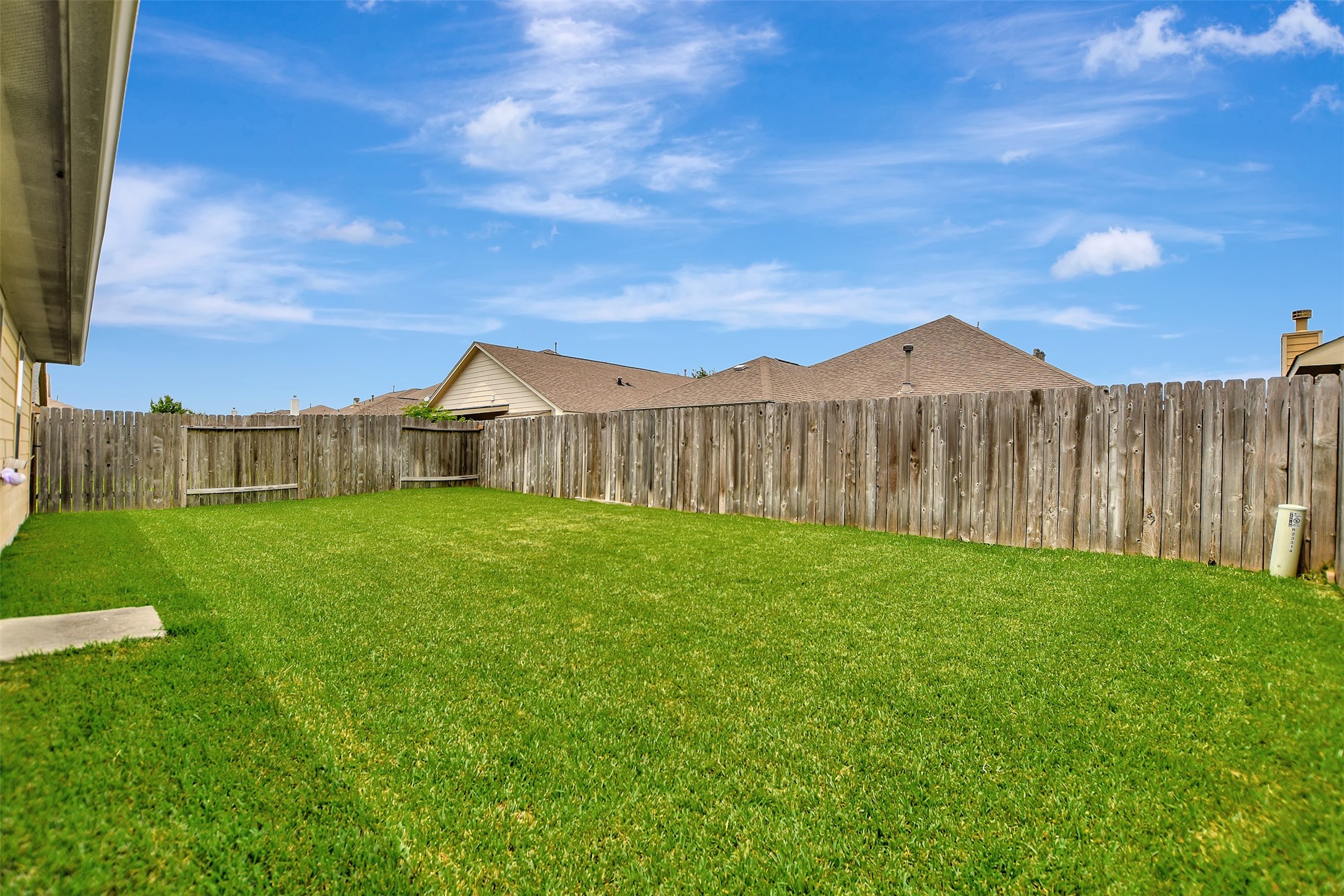 23314 Sawmill Pass Spring, TX 77373 - Photo 36 of 41 a view of a garden with a house in the background