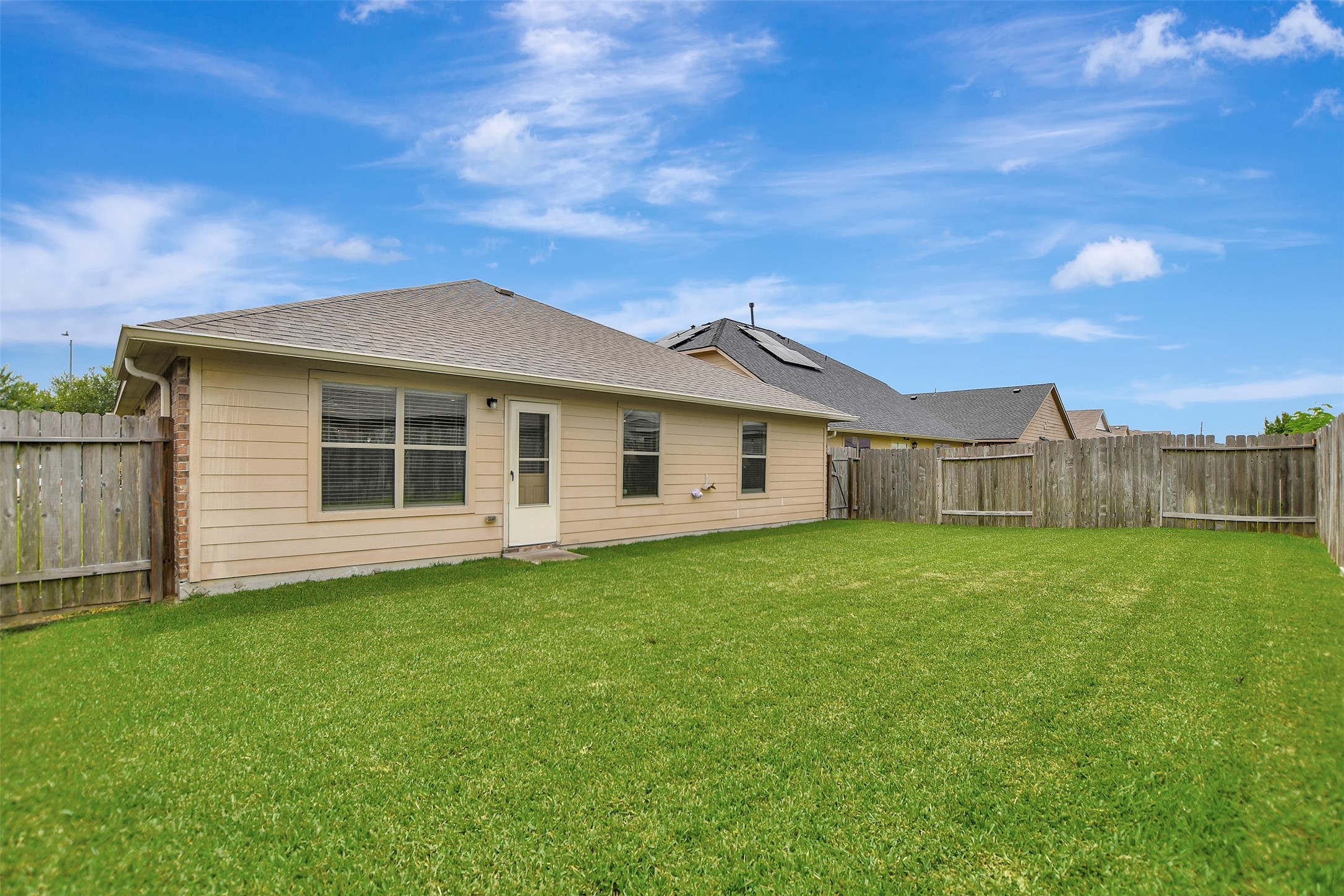 23314 Sawmill Pass Spring, TX 77373 - Photo 40 of 41 a view of a yard in front of a house with large tree