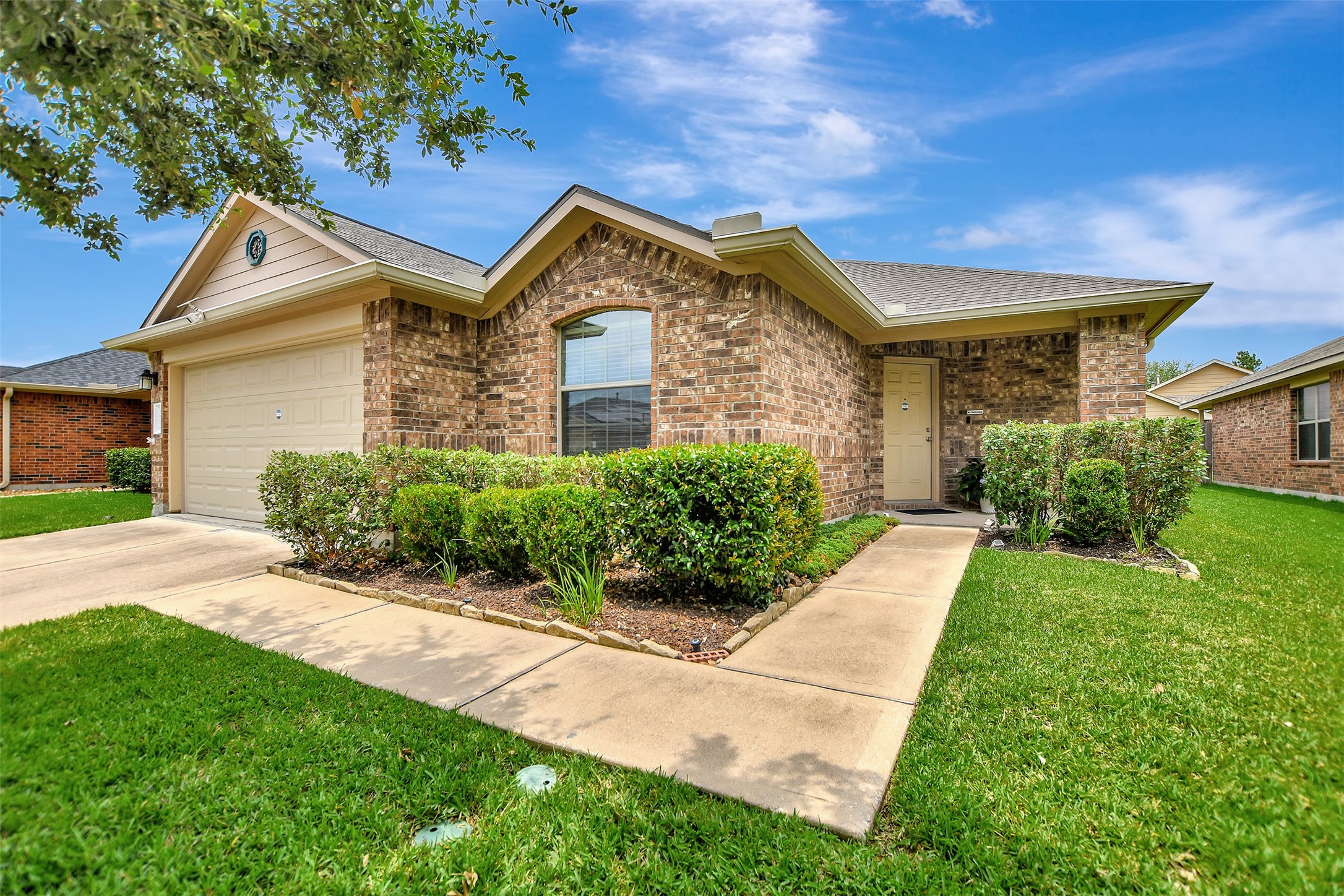 23314 Sawmill Pass Spring, TX 77373 - Photo 4 of 41 a front view of a house with a yard