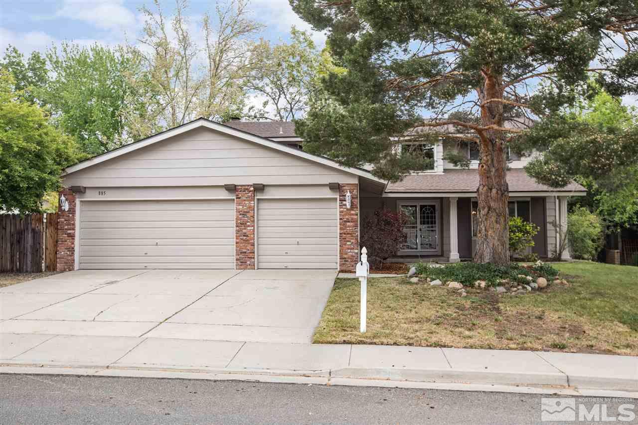 885 Twin Pines Road Reno, NV 89509 - Photo 1 of 25 a front view of a house with garden
