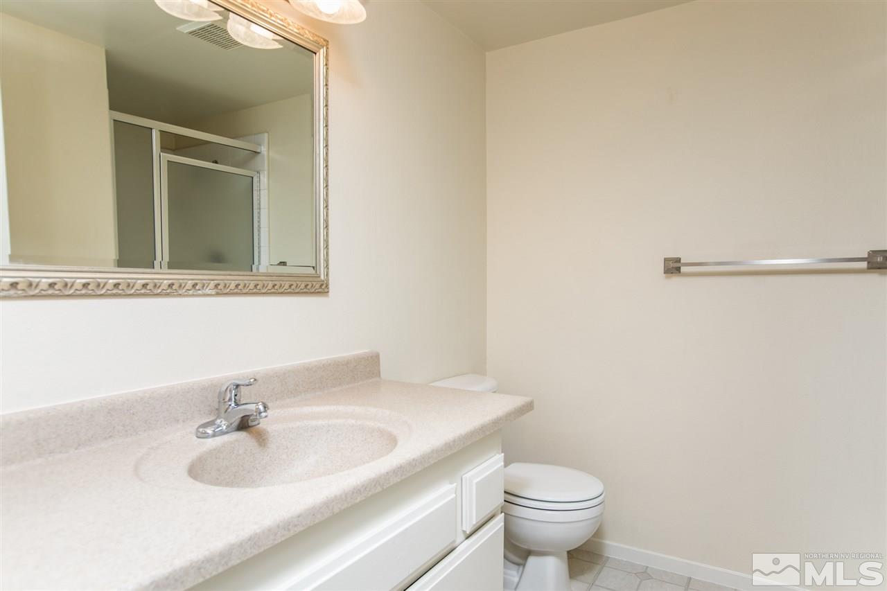 885 Twin Pines Road Reno, NV 89509 - Photo 12 of 25 a bathroom with a sink and a toilet
