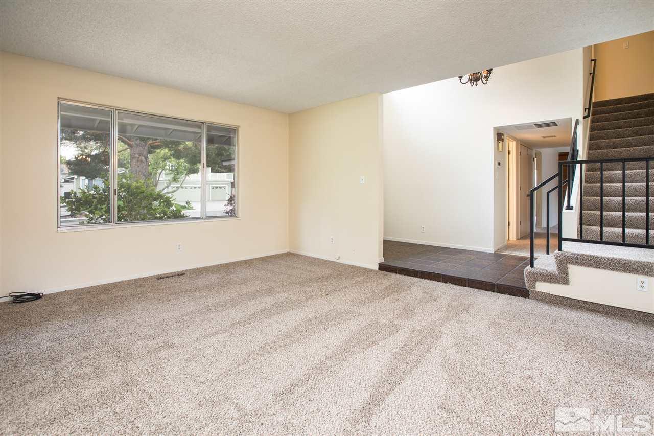 885 Twin Pines Road Reno, NV 89509 - Photo 2 of 25 an empty room with windows