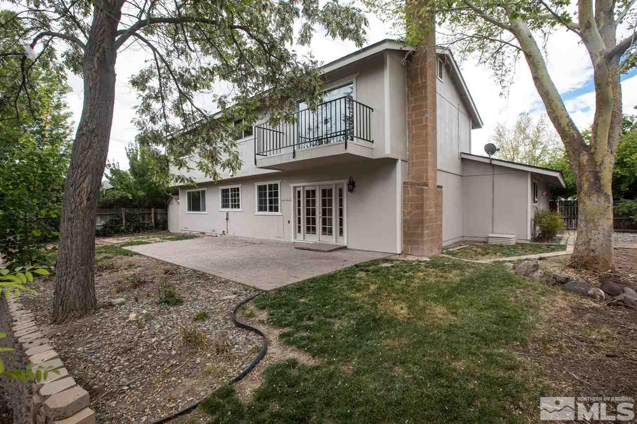 885 Twin Pines Road Reno, NV 89509 - Photo 23 of 25 front view of a house with a yard