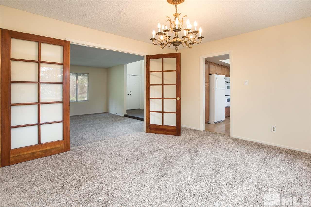 885 Twin Pines Road Reno, NV 89509 - Photo 4 of 25 a view of an empty room with a window