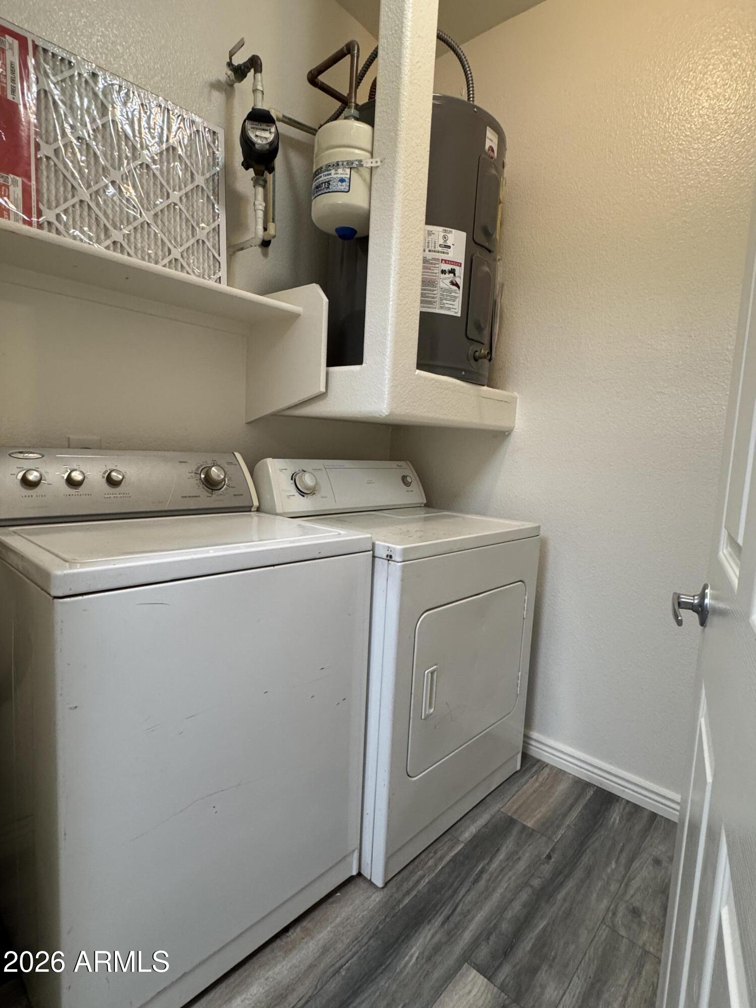 18416 North Cave Creek Road, Unit 2033 Phoenix, AZ 85032 - Photo 14 of 18 a utility room with dryer and washer