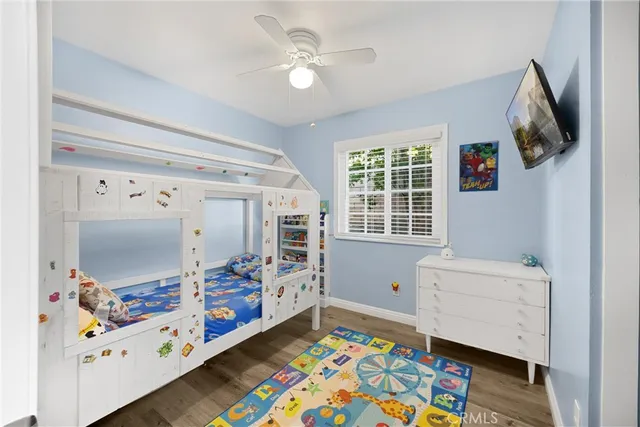 a room with toys and dresser