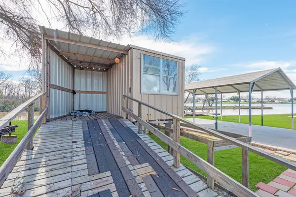 a view of a building with a yard