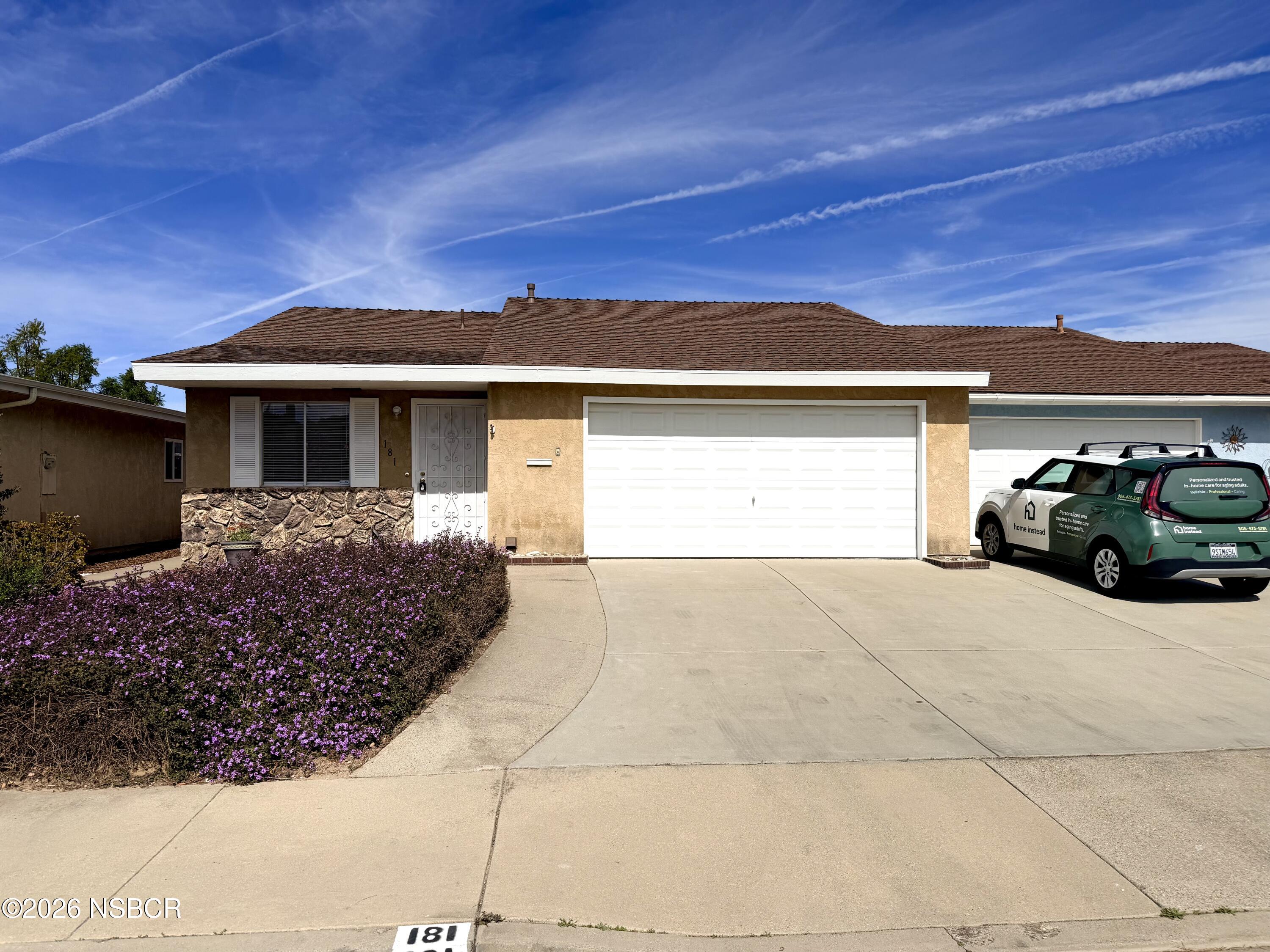 181 Janet Avenue Grover Beach, CA 93433 - Photo 1 of 21 a front view of a house with a yard