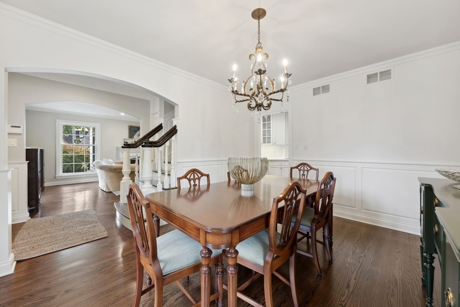 312 Forest Road Hinsdale, IL 60521 - Photo 10 of 49 a view of a dining room with furniture and wooden floor