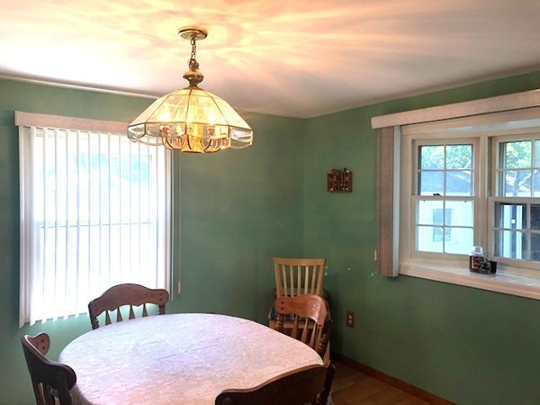 15 Primrose Road Billerica, MA 01821 - Photo 9 of 26 a bedroom with a bed and a window