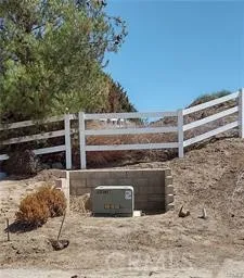 a view of a dry yard covered with snow