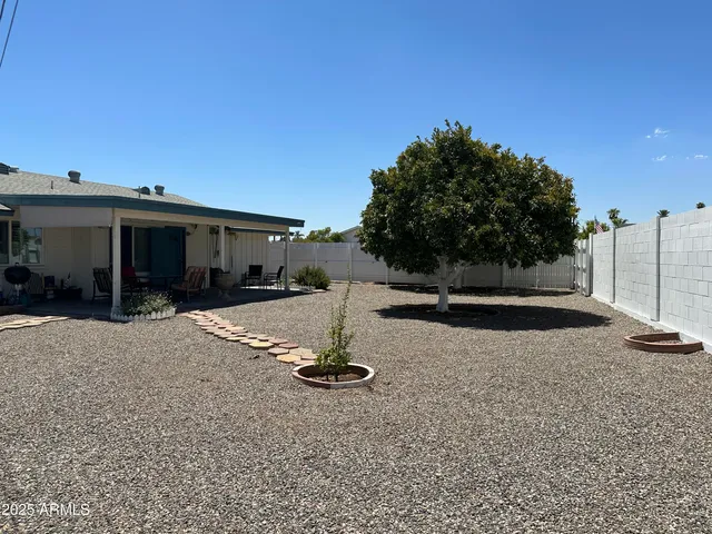 a view of a house with a street