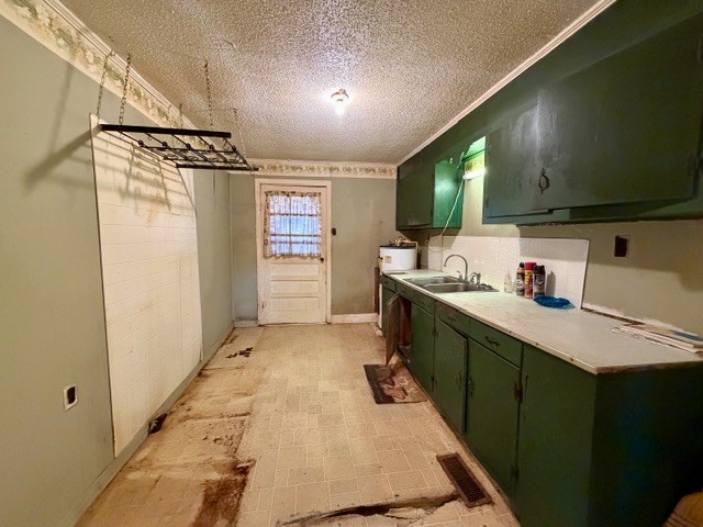 9554 Brooksie Thompson Road Bath Springs, TN 38311 - Photo 17 of 45 a kitchen with refrigerator and window
