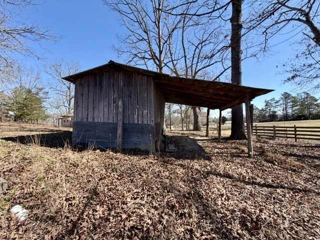 9554 Brooksie Thompson Road Bath Springs, TN 38311 - Photo 41 of 45 a view of a backyard of the house