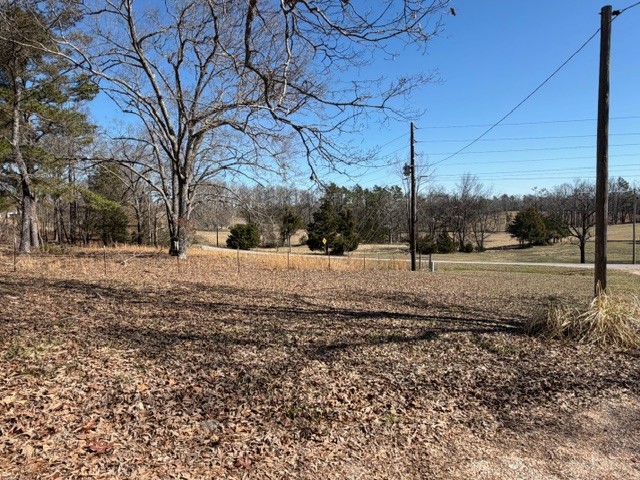 9554 Brooksie Thompson Road Bath Springs, TN 38311 - Photo 5 of 45 a view of road covered with snow