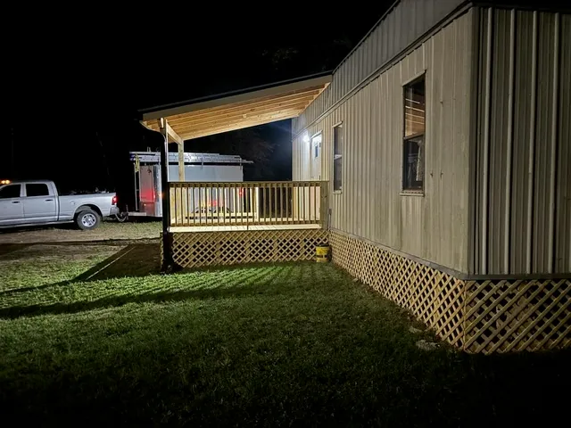 a view of a porch with a yard