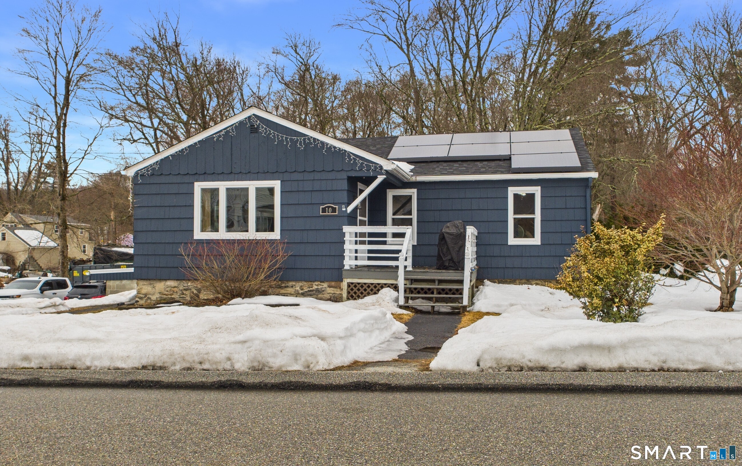 10 1st Street Thompson, CT 06255 - Photo 1 of 28 a view of a house with snow in front of it
